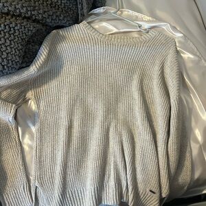 Tan hollister sweater.